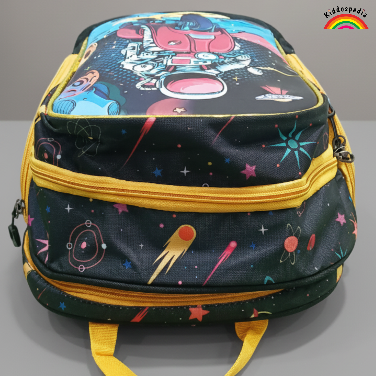Backpack with space-themed design on a gray background