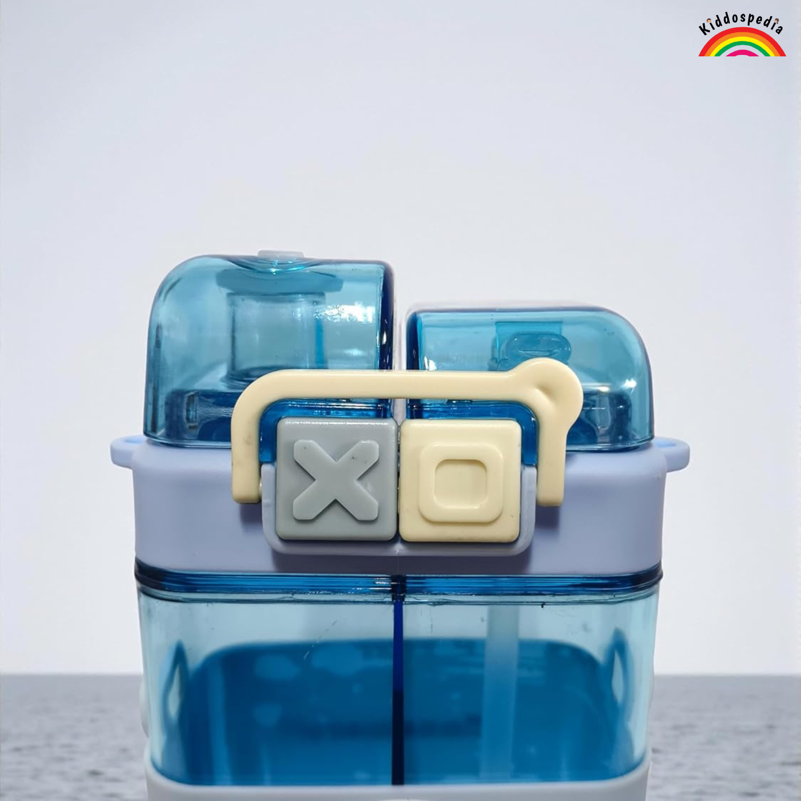 Blue plastic container with X and O symbols on a white background