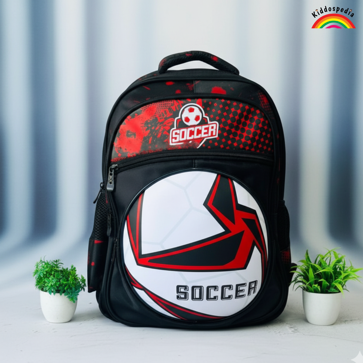 Black backpack with soccer ball design on a light gray background