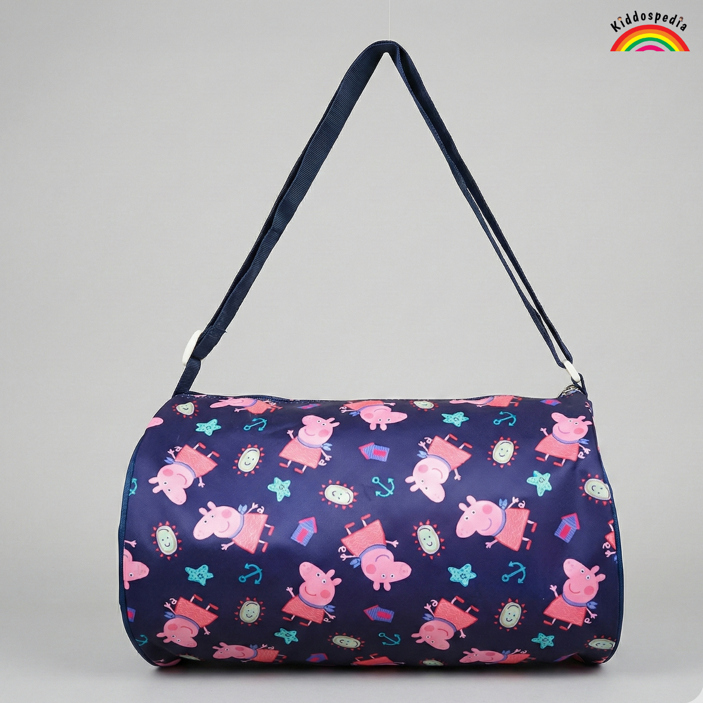 Navy blue bag with pink cartoon characters on a gray background