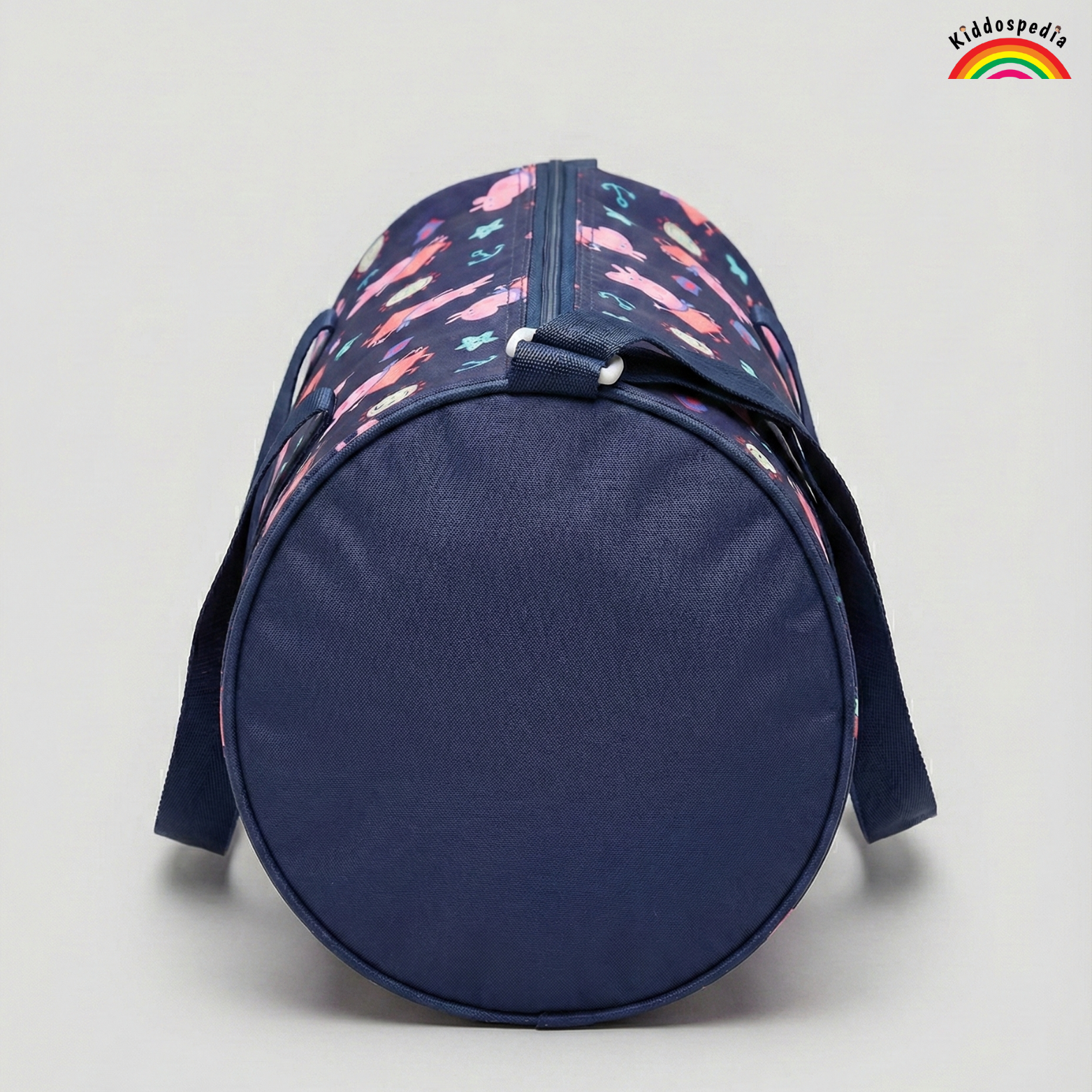Navy blue duffel bag with colorful pattern on a light gray background